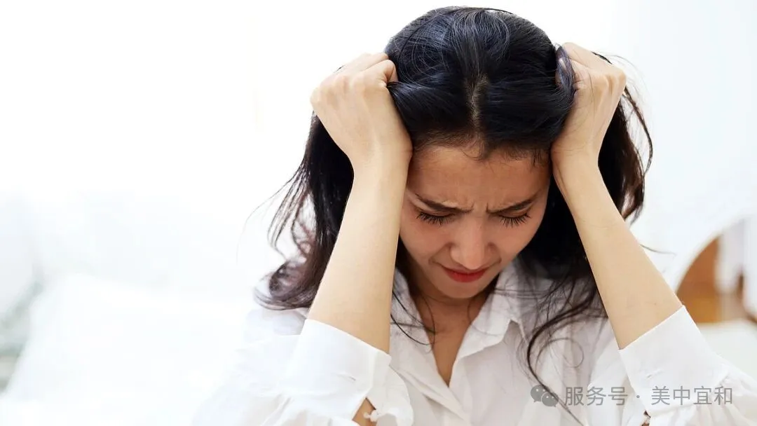 Young woman experiencing anxiety and distress after fibroid diagnosis